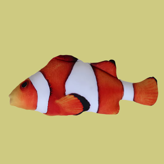 Red and white clownfish toy on a white background